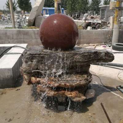 Wholesale natural stone red granite spinning water ball garden fountain